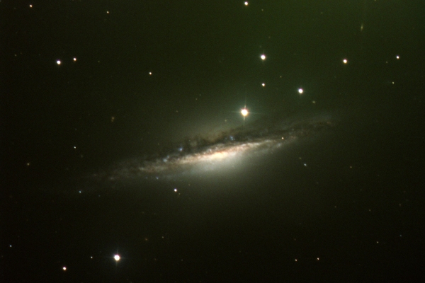 NGC1055 An edge on Spiral Galaxy; Credit © NSO & David Churchward